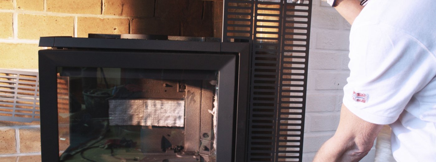 Installation av braskamin. Foto.