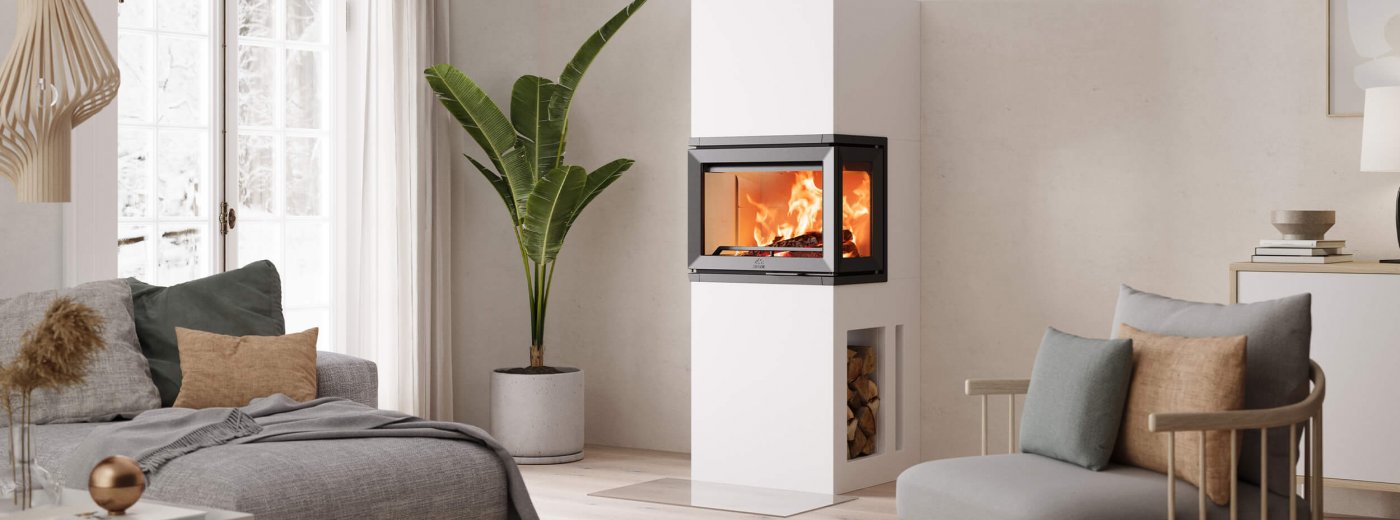 Jøtul FS 520 FRL vit öppen spis i ett ljust modernt skandinaviskt vardagsrum